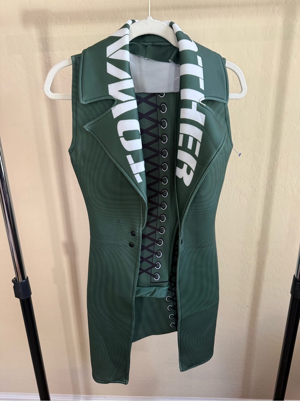 Green Sleeveless Lace-Up Trench Vest with White Collar Text
